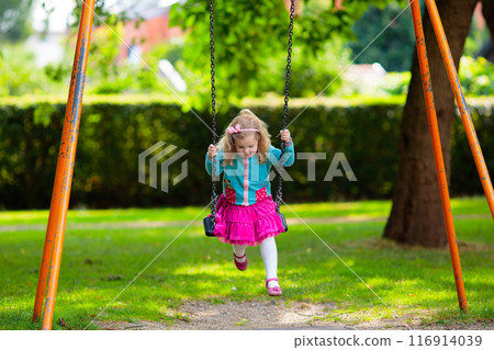 Kids explore nature. Children play in sunny park. Kids explore nature. Children play in sunny park. 116914039