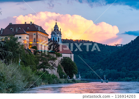 Durnstein town and Donau river in Wachau valley Austria on sunset. Traditional wine and tourism region, Durnstein town and Donau river in Wachau valley Austria on sunset. Traditional wine and tourism region, 116914203