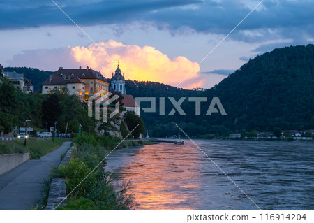 Durnstein town and Donau river in Wachau valley Austria on sunset. Traditional wine and tourism region, Durnstein town and Donau river in Wachau valley Austria on sunset. Traditional wine and tourism region, 116914204