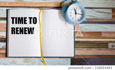 Time to Renew, text on a notepad, next to the alarm clock. Business concepts, strategy, plans Time to Renew, text on a notepad, next to the alarm clock. Business concepts, strategy, plans 116914481