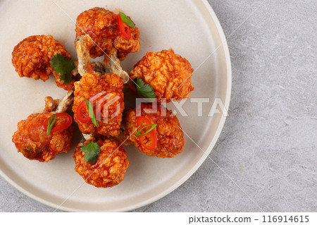 Grilled chicken wings with vegetable and spices flat lay on white background, food ideas concept 116914615
