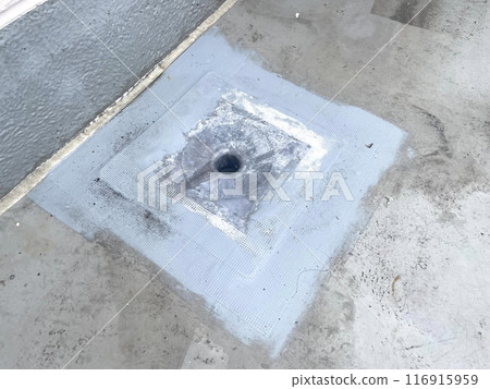 Installing a repair drain in a drainage ditch that was potentially leaking 116915959