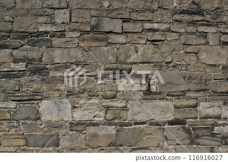 Decorative wall made of natural stones. 116916027