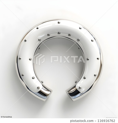 This image features a weathered iron horseshoe, showcasing traditional craftsmanship with its rivets and sturdy design. It serves as a timeless symbol of good luck and protection, reflecting rustic he 116916762