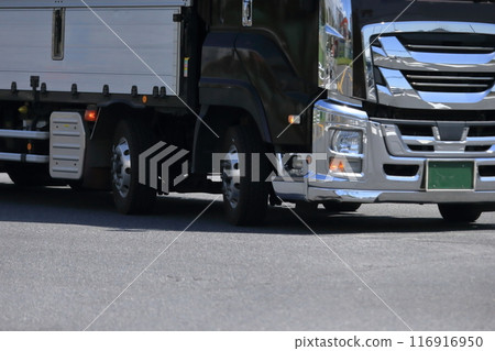 A large truck turning right at an intersection A large truck turning right at an intersection 116916950