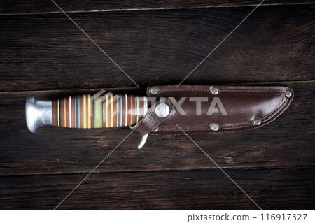 hunting knife with leather holster 116917327