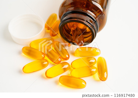 Fish oil Omega 3 capsules vitamin with EPA and DHA isolated on white background. Fish oil Omega 3 capsules vitamin with EPA and DHA isolated on white background. 116917480