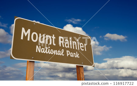 Mount Rainier National Park (Washington) Road Sign Against Blue Sky and Clouds. 116917722
