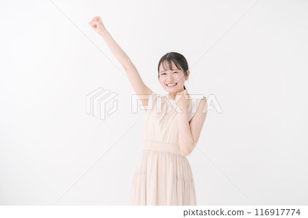 A cheerful lady who plays guts pose 116917774