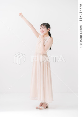 A cheerful lady who plays guts pose A cheerful lady who plays guts pose 116917776