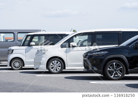 Cars parked in a parking lot Cars parked in a parking lot 116918250