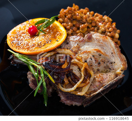 Pork steak, lentil, grilled orange 116918645
