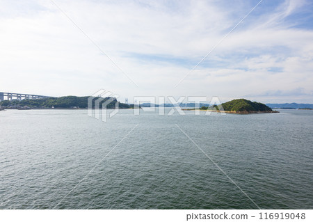 A beautiful summer view of the Seto Inland Sea and the Great Seto Bridge seen from the sea A beautiful summer view of the Seto Inland Sea and the Great Seto Bridge seen from the sea 116919048