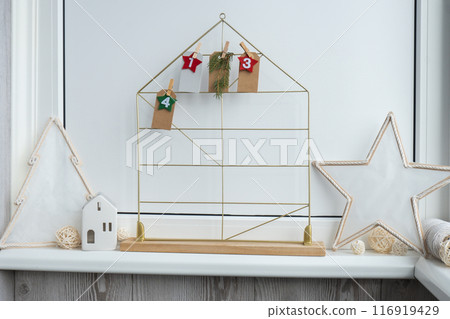 Step by step instruction of making handmade Christmas advent calendar. Creative craft homemade decor. New year celebration. Winter Step by step instruction of making handmade Christmas advent calendar. Creative craft homemade decor. New year celebration. Winter 116919429