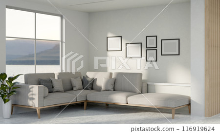 The interior design of a contemporary living room featuring a large comfortable couch and decor. The interior design of a contemporary living room featuring a large comfortable couch and decor. 116919624