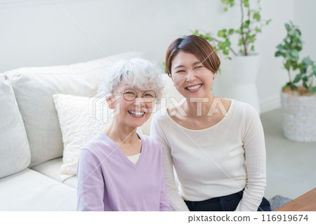 Elderly mother and daughter (family) 116919674