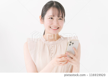 Young woman looking at a smartphone 116919920