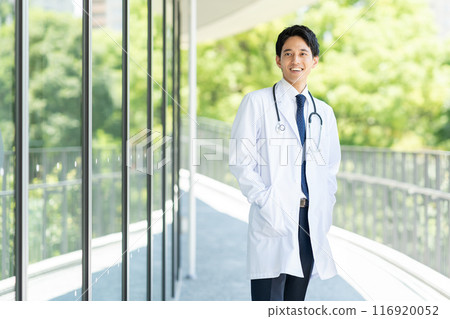 Young male doctor working in a hospital 116920052
