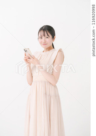 Young woman looking at a smartphone 116920998