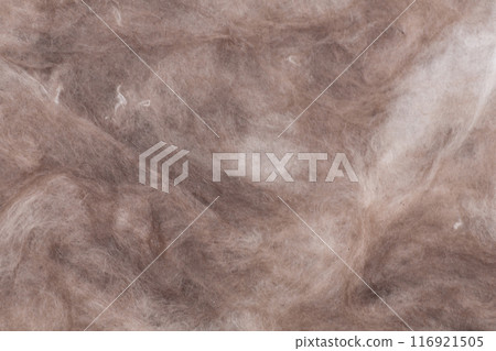 Construction worker thermally insulating house mineral wool attic with glass wool 116921505