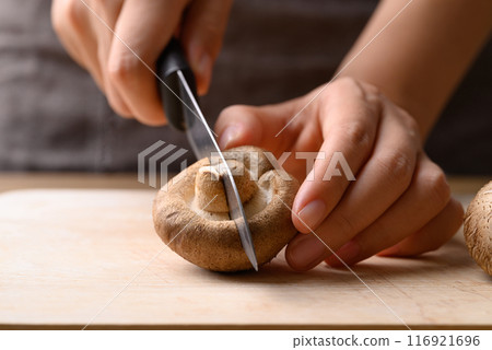Fresh shiitake mushroom prepare for cooking, edible mushroom and food ingredient in Asian cuisine Fresh shiitake mushroom prepare for cooking, edible mushroom and food ingredient in Asian cuisine 116921696