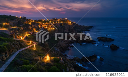 A picturesque cliffside with glowing lights, ready to captivate visitors at a coastal light festival. A picturesque cliffside with glowing lights, ready to captivate visitors at a coastal light festival. 116922011
