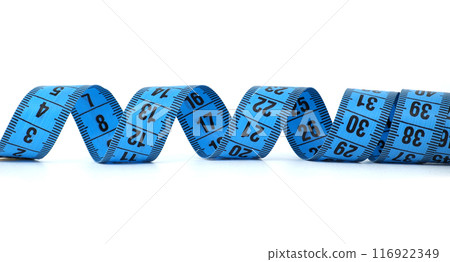 Close-up of blue measuring tape isolated on white background showcasing numbers 116922349