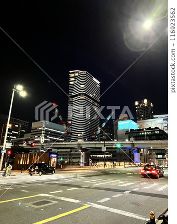 Road and buildings at night 116923562