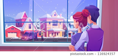 Hugging couple looking through window on city 116924357