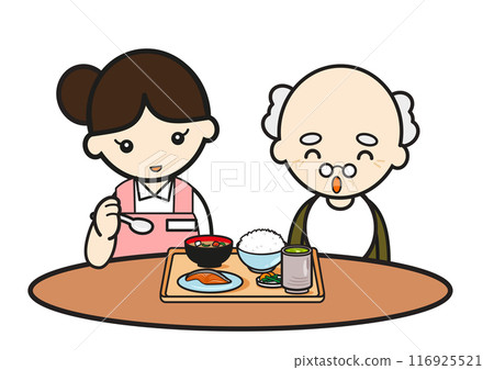 A caregiver and an elderly man helping with meals 116925521