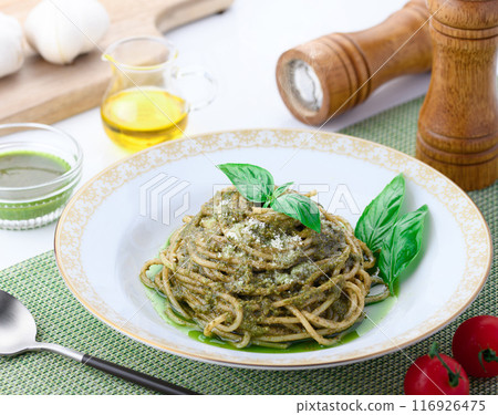Bright green pasta with Genovese basil 116926475