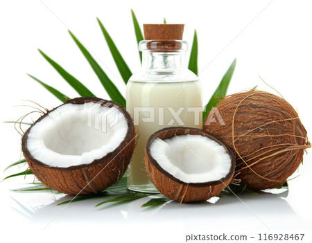 Coconut Oil and Halved Coconuts on Palm Leaf Coconut Oil and Halved Coconuts on Palm Leaf 116928467
