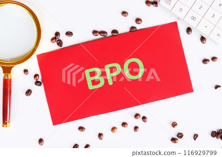 Business concept. Letters BPO. Business Process Outsourcing on a red card on a white background with coffee beans scattered next to it 116929799