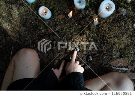 An Enchanting Forest Ritual that incorporates Candles, Crystals, and various elements of natures magic 116930891