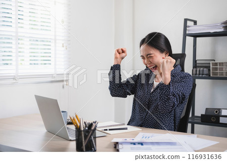 Young businesswoman celebrated her success. 116931636