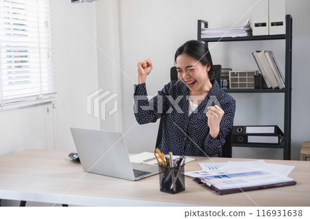 Young businesswoman celebrated her success. 116931638