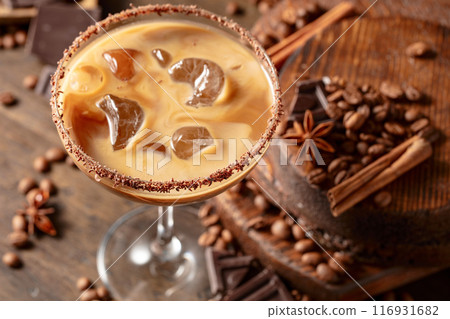 Cream and coffee cocktail with ice. 116931682