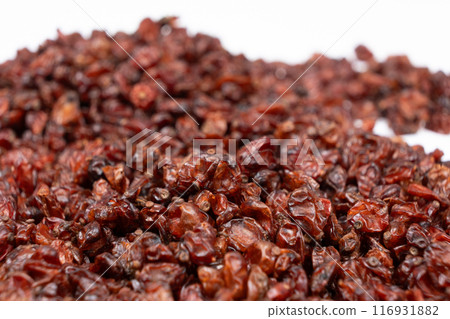 Red dried barberry on white background 116931882