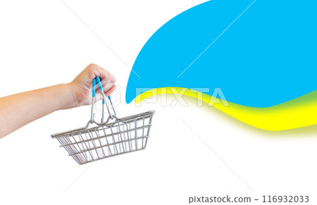 Kid hand carries Small shopping basket on white background. It is a symbol of online shopping. 116932033
