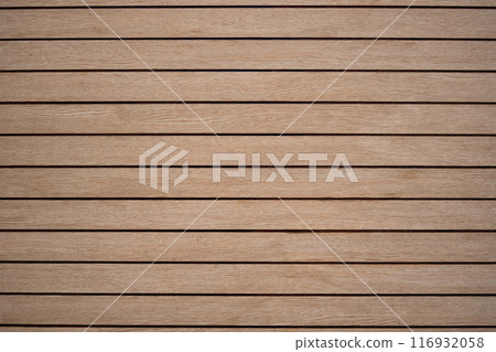 Arranged pattern  brown wooden planks board background makes you feel warm and natural. 116932058