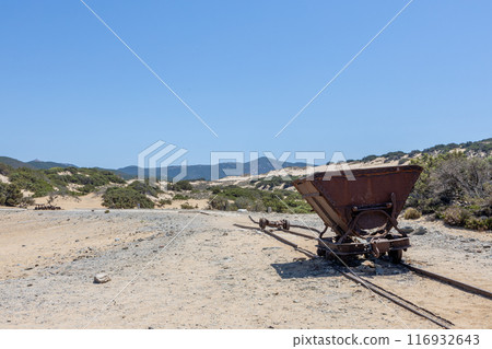 Abandoned Mining Cart in Desert Landscape Abandoned Mining Cart in Desert Landscape 116932643