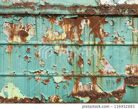 Background texture of scratched rusted steel with peeling paint Background texture of scratched rusted steel with peeling paint 116932883