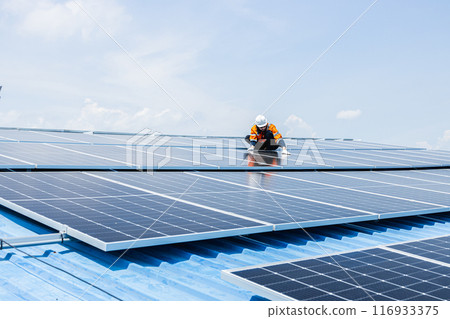 Professional Engineer Service Solar Panel. Worker Maintenance Cleaning Replacing Solar Panel. Solar photovoltaic panel system in Industry roof. Saving Energy with Clean Power. 116933375
