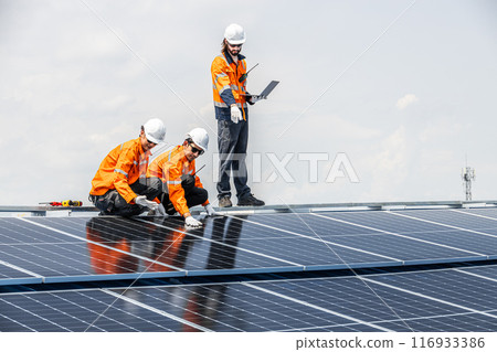 Group of Professional Engineer Service Solar Panel. Worker Team Maintenance Cleaning Replacing Solar Panel. Solar photovoltaic panel system in Industry roof. Saving Energy with Clean Power. Group of Professional Engineer Service Solar Panel. Worker Team Maintenance Cleaning Replacing Solar Panel. Solar photovoltaic panel system in Industry roof. Saving Energy with Clean Power. 116933386