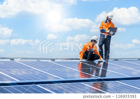 Professional Engineer Service Solar Panel. Worker Maintenance Cleaning Replacing Solar Panel. Solar photovoltaic panel system in Industry roof. Saving Energy with Clean Power. Professional Engineer Service Solar Panel. Worker Maintenance Cleaning Replacing Solar Panel. Solar photovoltaic panel system in Industry roof. Saving Energy with Clean Power. 116933391