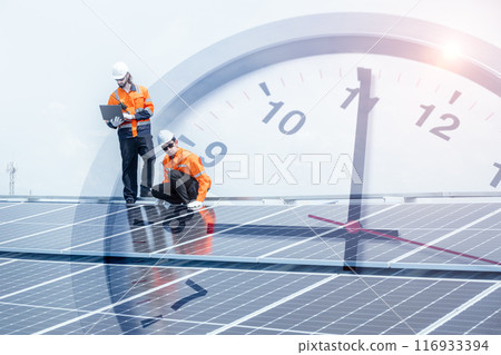Engineer worker team service solar panel overlay time clock face for time to saving energy concept. 116933394
