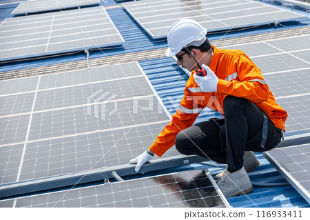 Professional Engineer Service Solar Panel. Worker Maintenance Cleaning Replacing Solar Panel. Solar photovoltaic panel system in Industry roof. Saving Energy with Clean Power. 116933411