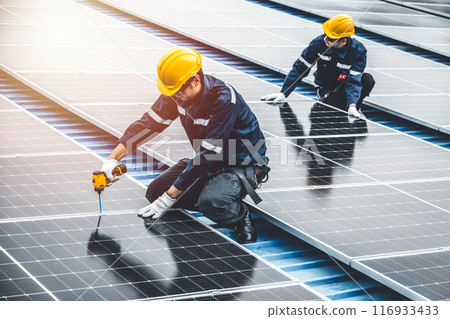 Professional Engineer Service Solar Panel. Worker Maintenance Cleaning Replacing Solar Panel. Solar photovoltaic panel system in Industry roof. Saving Energy with Clean Power. 116933433