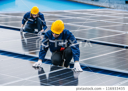 Professional Engineer Service Solar Panel. Worker Maintenance Cleaning Replacing Solar Panel. Solar photovoltaic panel system in Industry roof. Saving Energy with Clean Power. Professional Engineer Service Solar Panel. Worker Maintenance Cleaning Replacing Solar Panel. Solar photovoltaic panel system in Industry roof. Saving Energy with Clean Power. 116933435