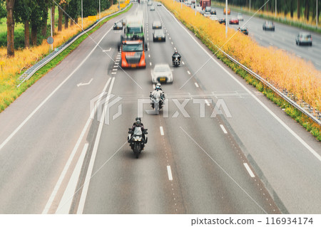 Group of bikers driving on autobahn. Selective focus 116934174